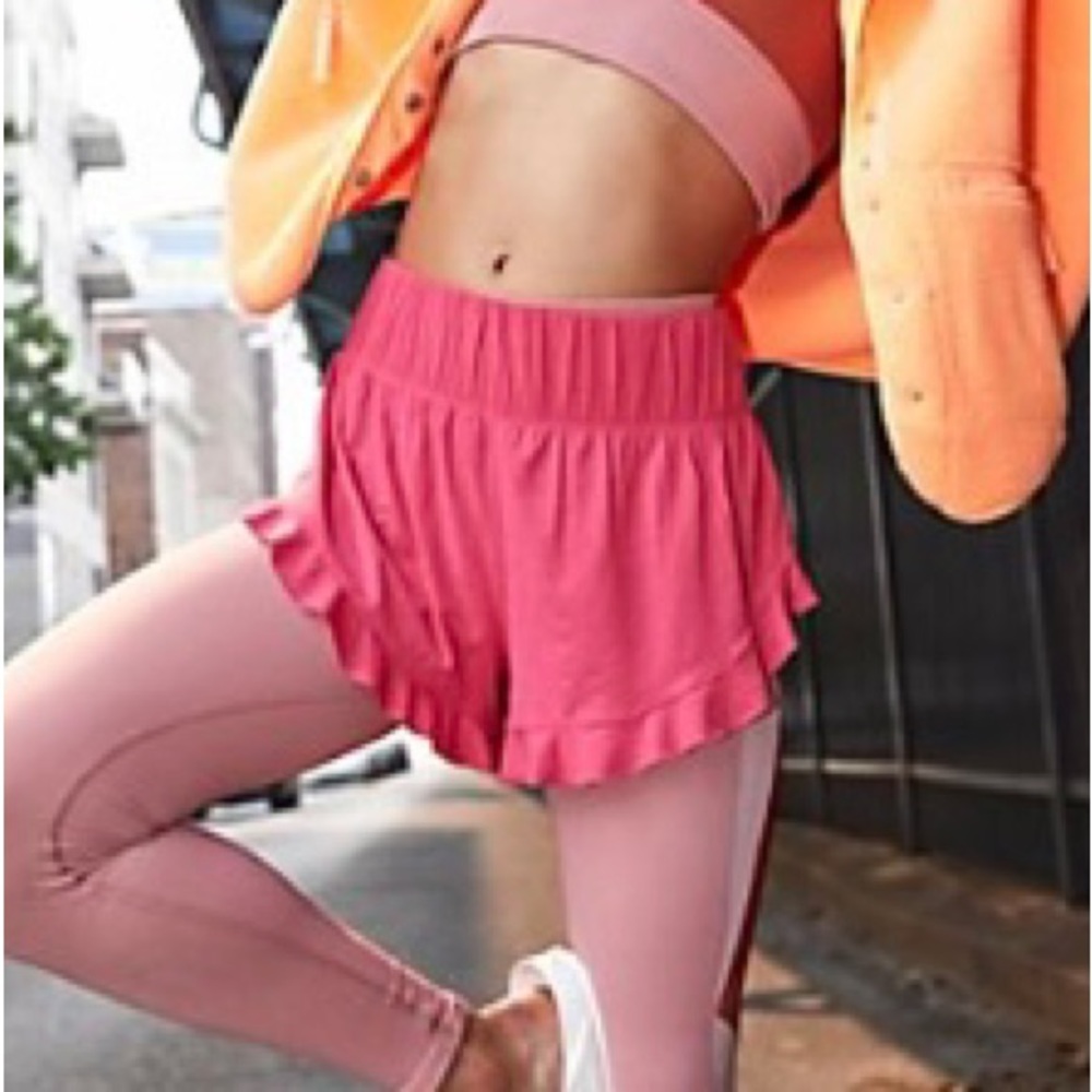 Like new Featherweight Layering Shorts in wild raspberries color